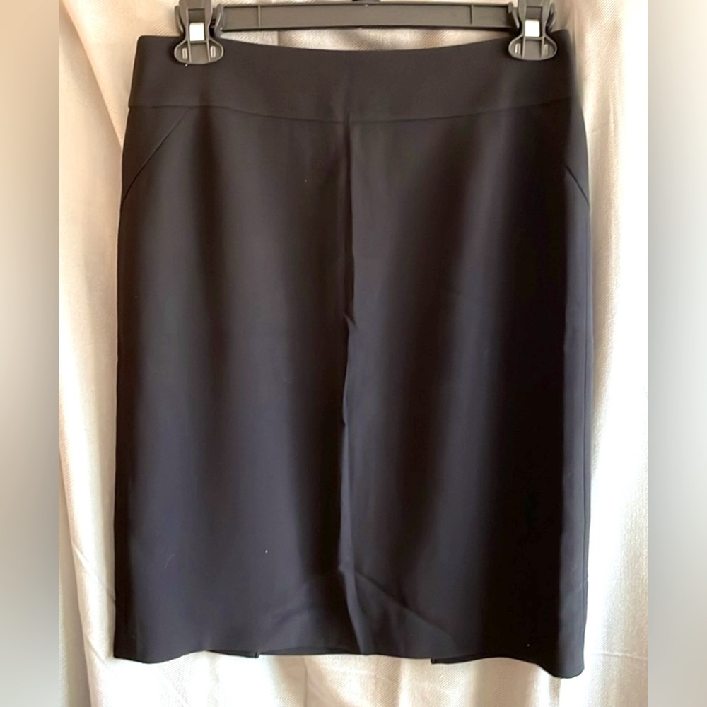 Ann Taylor black lined skirt - Size 8.  Double split detail on back.